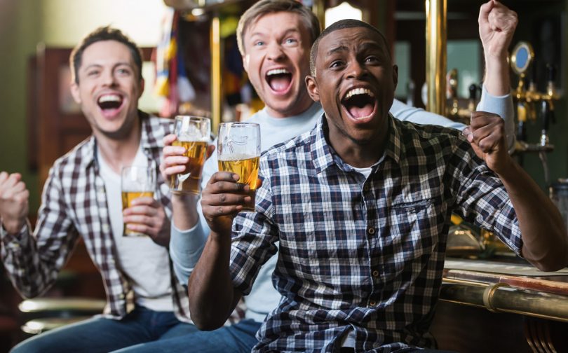 3GuysCheeringAdobeStock 109680443 810x504